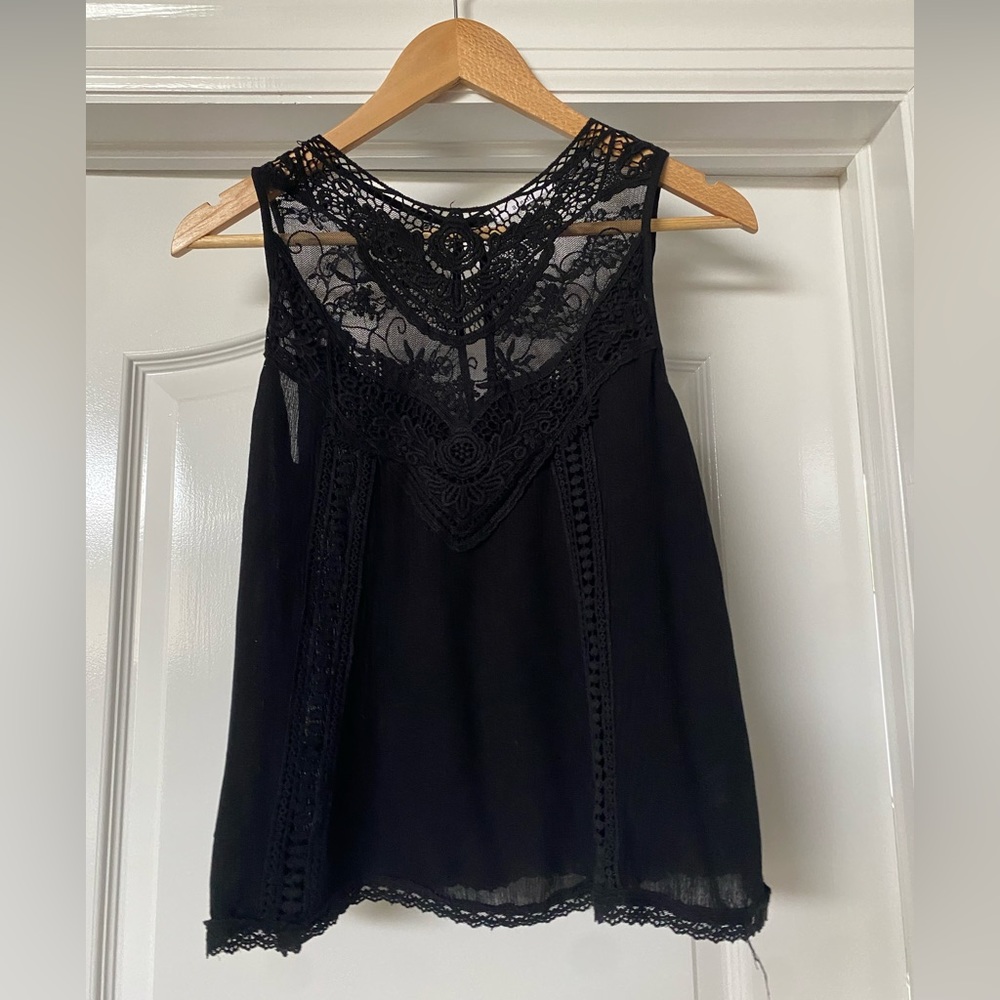 Women’s black top with lace detail